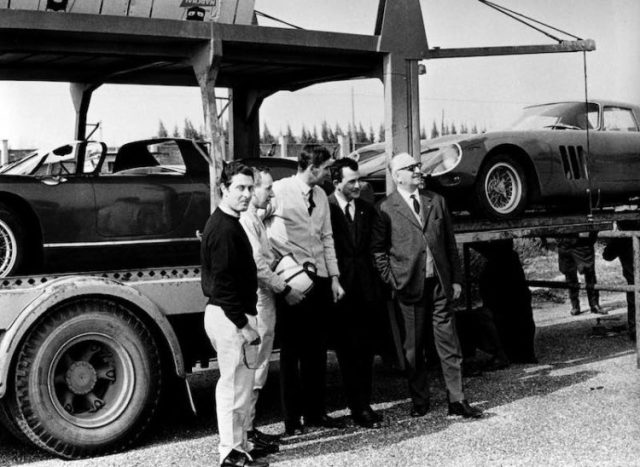 Enzo Ferrari with Scarfiotti, Parkes, Surtees and Vaccarella at the Modena airfield during a practice session.jpg